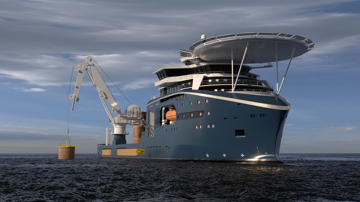 A large offshore construction vessel is seen from a low angle at sea, with a dark blue hull and a wide white superstructure topped by a circular helipad marked with an “H.