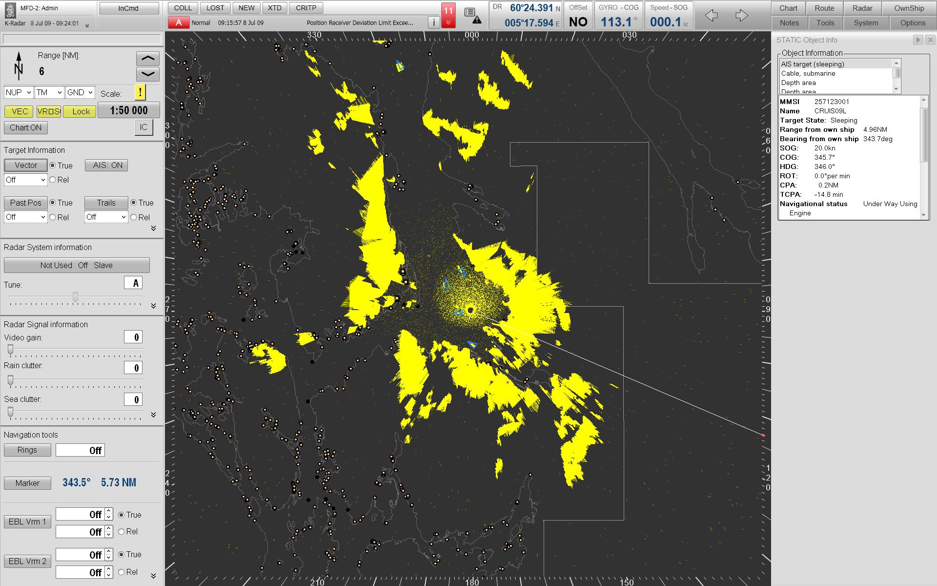 Radar display with a dark background showing yellow clusters representing targets or weather patterns around a central point, overlaid with range rings and grid lines. 