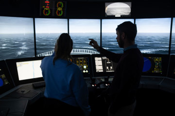 Simulation-based training at NMCI, where students develop practical skills in navigation, communication and situational awareness under instructor guidance.